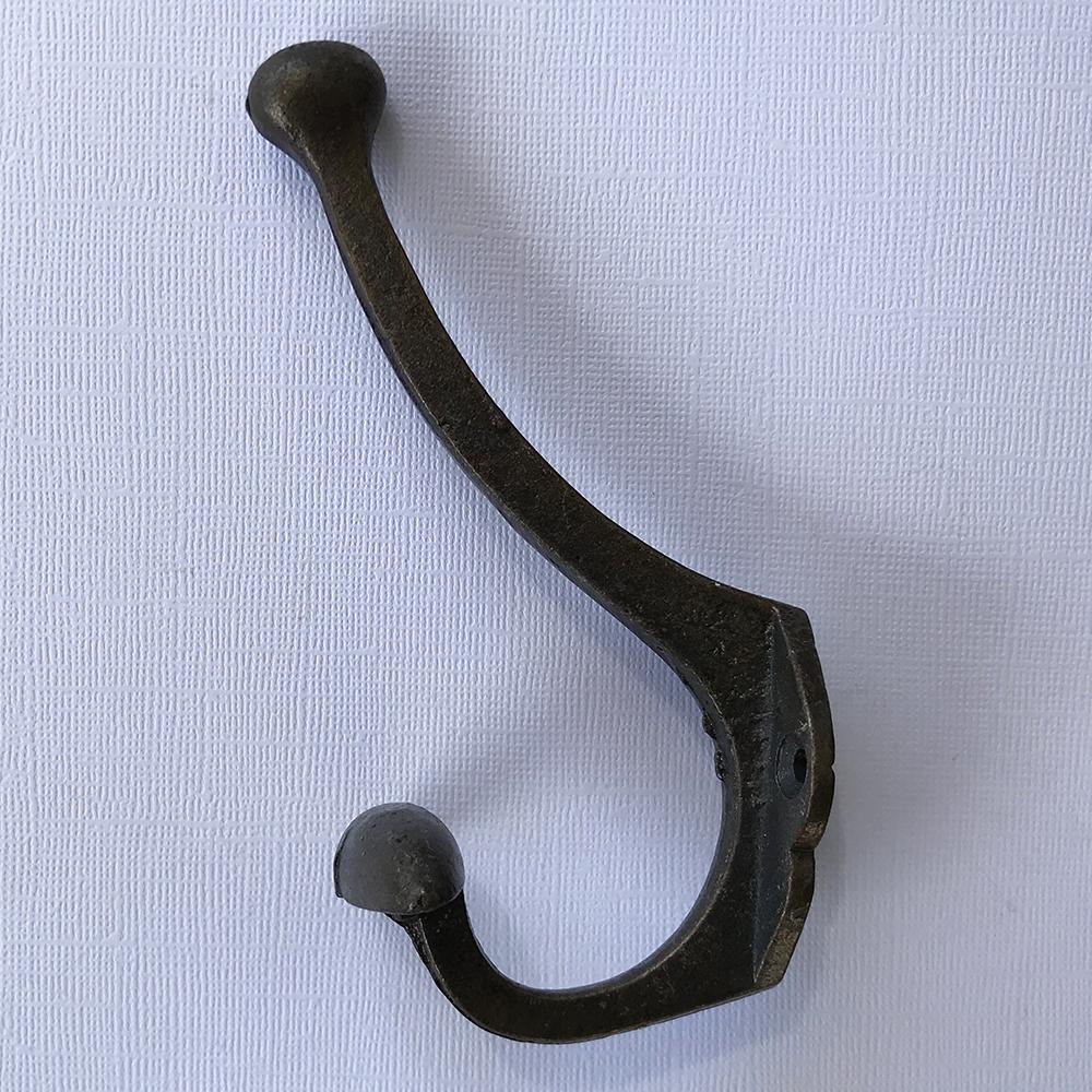 https://www.hooksandknobs.com/cdn/shop/products/cast-iron-whale-tail-wall-hook-hook-drawer-cabinet-knobs-and-pulls-sku-2_2000x.jpg?v=1579406270